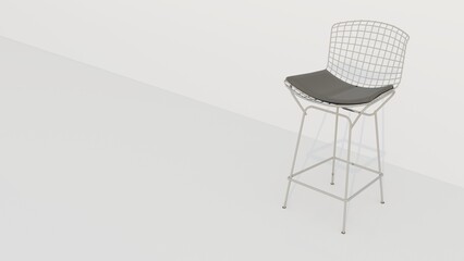 A white chair with a black cushion sits on a white wall