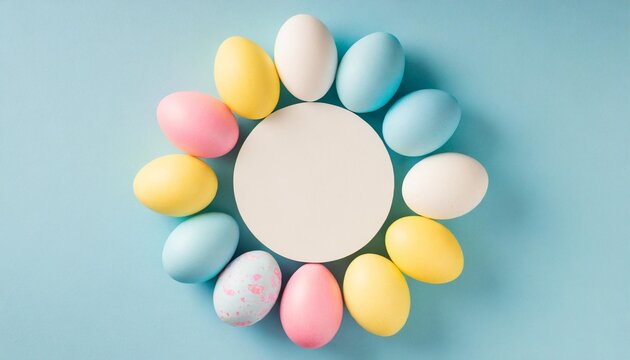 easter celebration concept top view photo of ordered composition white circle yellow blue and pink easter eggs on isolated pastel blue background with copyspace