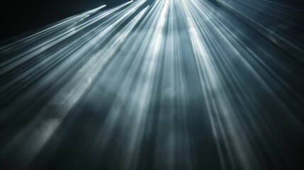 Beautiful rays of light against a black background.
