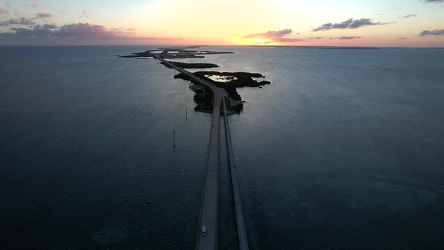 Drone Seven Mile Bridge Florida Key Sunset. Dark Dusk with Sun Setting on the Horizon
