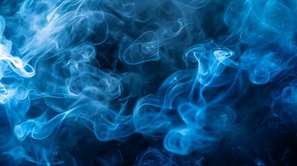 Obraz premium Ethereal beauty of blue smoke swirling through cold air.