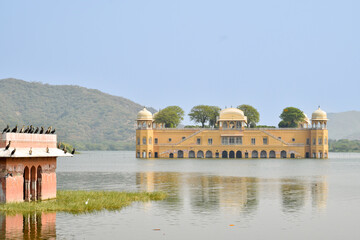 View of Jal Mahal over Lake in Jaipur. Tourist attraction for many travelers