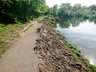 Landslide damage on footpath around local loch in Mothewell, Scotland