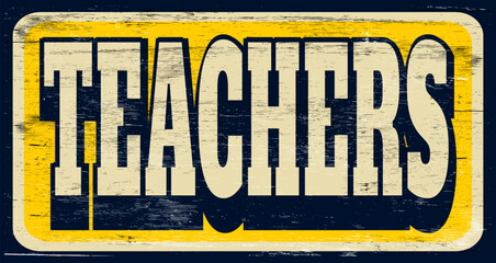 Aged and worn teachers sign on wood
