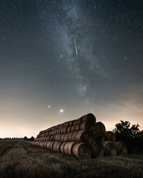 Perseids shooting star over field after harvest, Brandenburg, Germany, Europe