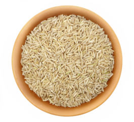 Brown rice in clay pot, uncooked and hulled, isolated on white, top view
