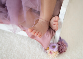 Obraz na płótnie Canvas newborn baby girl feet