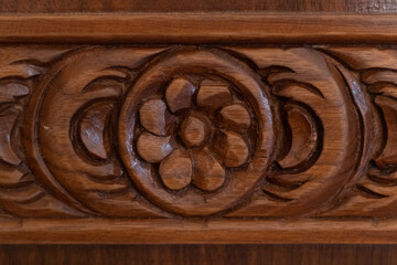 Close-up, Beautiful Arabic patterns carved from wood. Oriental architectural design.


