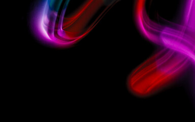 Abstract colorful irregular lines on black background and wall texture. Long exposure. Light painting photography.