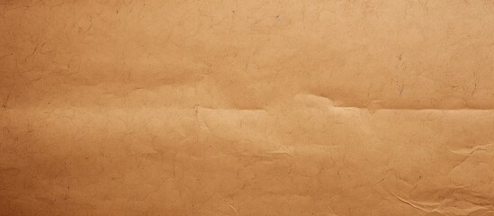 A close up of a piece of hardwood flooring in shades of brown, amber, and beige with a peach wood...