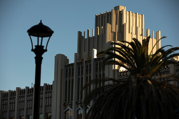 Sunlight light shines on historic downtown buildings of Redwood City, California, USA.