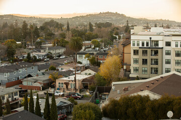 Fototapeta premium Sunset view of a dense housing neighborhood of Redwood City, California, USA.
