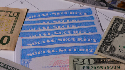10 photo of stack of social security cards ssn on turn table