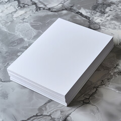 Stack of White Paper on Marbled Background