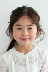 Portrait of a Smiling Young Girl with Curly Hair