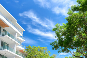 Apartment Balconies with Green Trees and Blue Sky