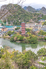 Lookout over Guilin City in South China. Ancient Pagoda in the middle
