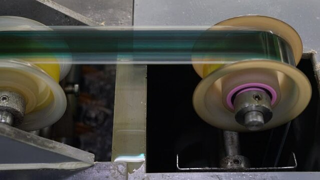 Movie film was running after cleaned in the water tank to next process, film developement process.