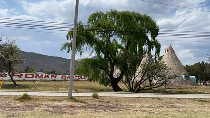 photography of tipis on the road from Zaragoza to Teziutlan Puebla Mexico