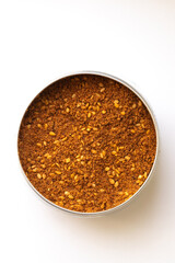 close up of Palestinian za'atar in container on white