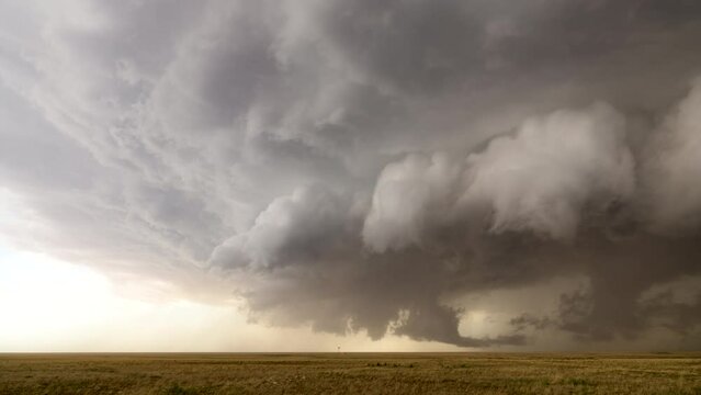 Strong inflow pulls dust and debris into a supercell thunderstorm.