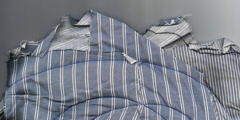 Detail of the texture of the folded crumpled fabric with the threads visible very clearly. Fabric...