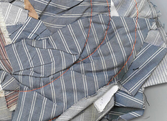 Detail of the texture of the folded crumpled fabric with the threads visible very clearly. Fabric...