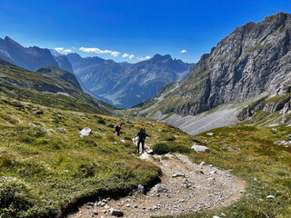 Fototapeta na wymiar Hiking in Tranquil Valleys Trails of Vanoise National Park, Hautes Alps, France