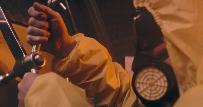 The video features an elderly person in a protective suit and gas mask, standing in a dark room of a nuclear bunker, closing the bunker door. This scene highlights the seriousness of the situation 