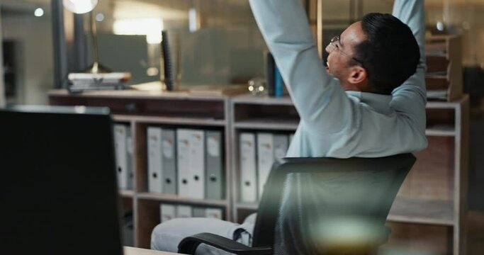 Business man, fist pump or celebration by computer in office, happy or success with stock trading at work. Asian person, shouting and good news of win in online trading, promotion and excited at desk