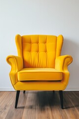Vibrant yellow modern armchair against a white wall, minimalist interior design.