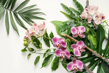 Foto op Canvas Floral arrangement with tropical leaves and orchids. Tropical flower decor on tree branch on white background. © kardaska