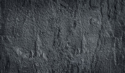 Dark grey black tiles stone wall  background or texture