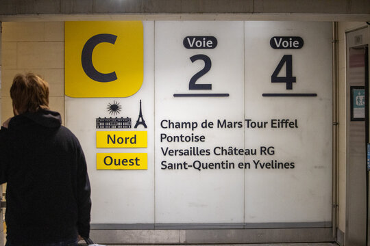 Paris, France, 9 November 2024 : Commuter Waiting at Train Station Platform.