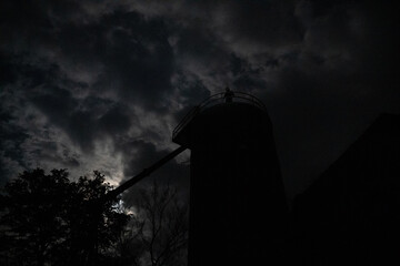large silo at night