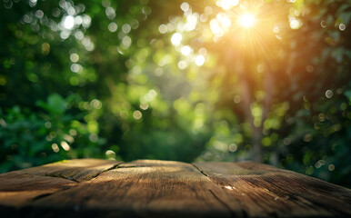 Empty wooden table top with blurred green spring nature background