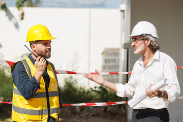 Man and engineer talking together.