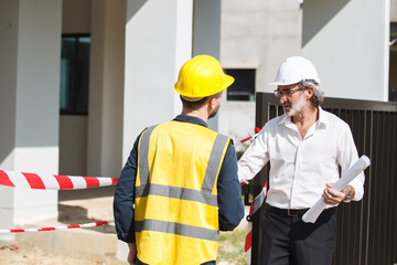 Man and engineer talking together.