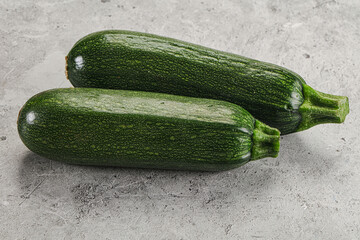 Raw green ripe zucchini vegetable