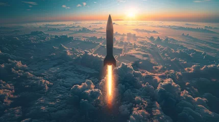Foto op Plexiglas Hypersonic missile. A combat rocket is flying above the clouds. © Media Srock