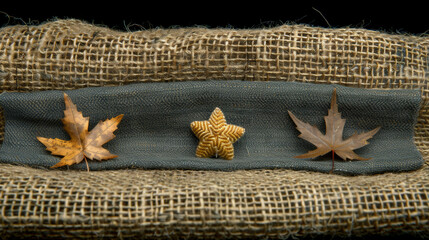 Three leaves are on a piece of cloth - obrazy, fototapety, plakaty
