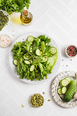 green salad with edamame beans and cucumbers