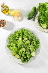 green salad with edamame beans and cucumbers