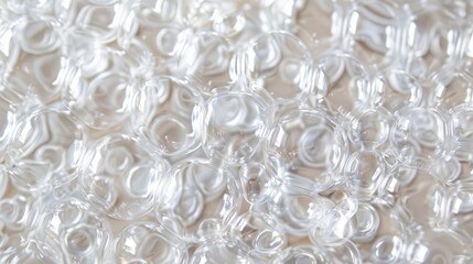Detailed close up of a white plastic bead with a textured background of bubble wrap, background, wallpaper