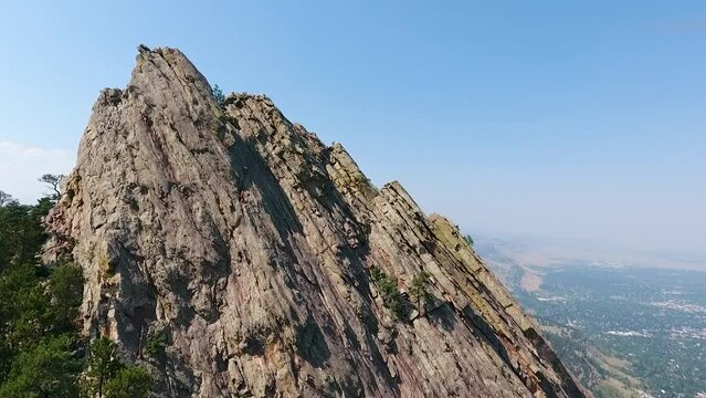 A spectacular 4K over the 2nd largest rock formation of the "The Flatirons", striking slanted rock formations that jut out of the Rocky Mountain foothills, just outside Boulder, Colorado.