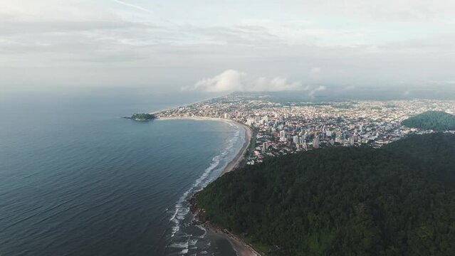 Aerial view of the sprawling city of Guaratuba, where its grandeur and size are magnificently showcased, nestled along the picturesque Paran&aacute; coast.