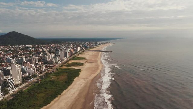 Lateral drone image showcasing the fully revitalized coastline of Caiobá-Matinhos.