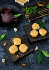 Mochi and teapot in forest-style background
