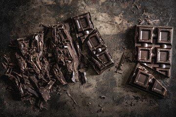 Dark Chopped Chocolate on Textured Background