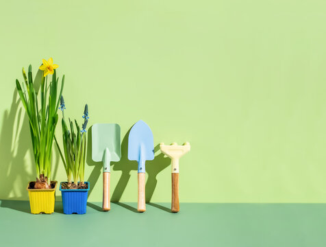 Concept preparation for garden season with rake and shovel